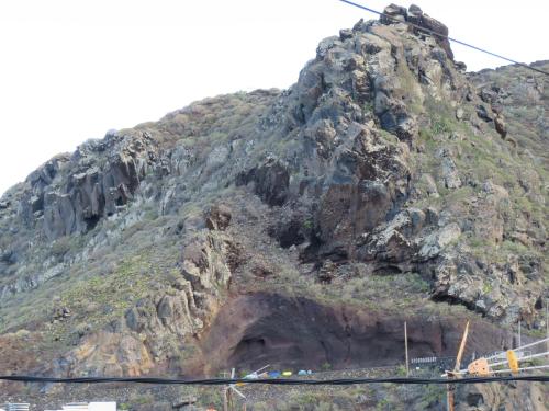 a large rocky mountain with a train on it at Mi Paraiso Vacacional, Isla del Hierro. in Tamaduste