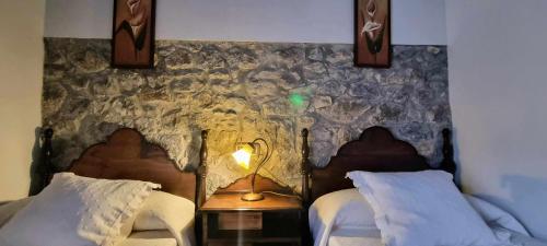 Katil atau katil-katil dalam bilik di Casa Vacacional Gerpe I