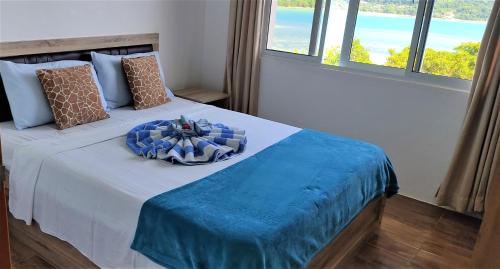 Posteľ alebo postele v izbe v ubytovaní Seychelles Yellow Petals