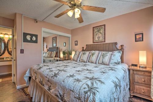 A bed or beds in a room at Breezy Kaunakakai Retreat with Community Pool!