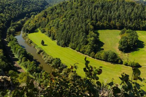 an aerial view of a river in a valley at Pension & Seminarhaus "Haus am Fluss" in Laurenburg