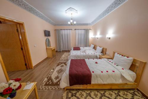Postel nebo postele na pokoji v ubytování Ksar Ben Youssef