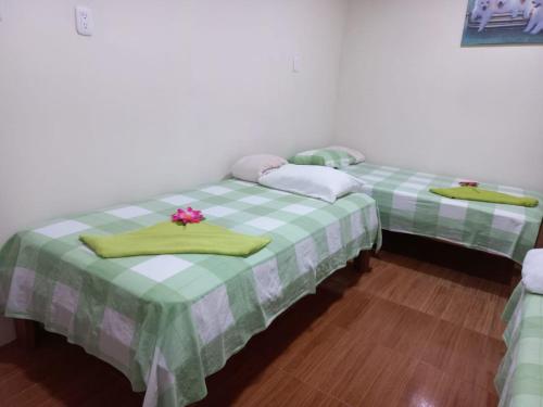Cama o camas de una habitación en Hotel Margarita Sierpe