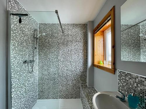 a bathroom with a shower and a sink at Failte Mhor in Fort William