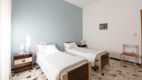 Un pat sau paturi într-o cameră la Appartamento Melathu con Wi-Fi