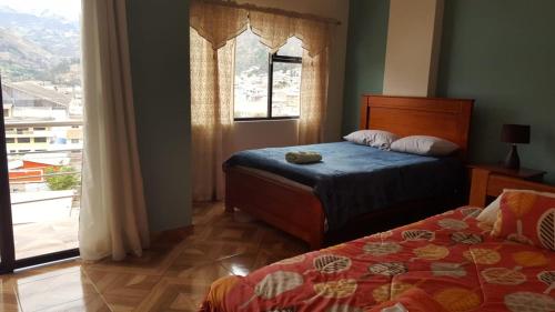 Postel nebo postele na pokoji v ubytování Hostal Resto - Bar "EL PEÑÓN"