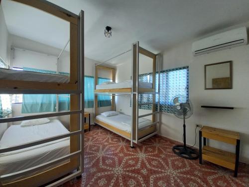 Postel nebo postele na pokoji v ubytování Bermejo Hostel