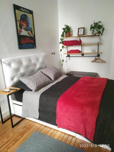 Postel nebo postele na pokoji v ubytování Lavalle Studio Buenos Aires