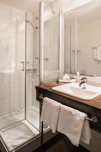 Koupelna v ubytování Hotel am Schlosspark garni