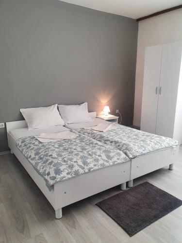 Ένα ή περισσότερα κρεβάτια σε δωμάτιο στο Rooms Nikola Rule Ostojic