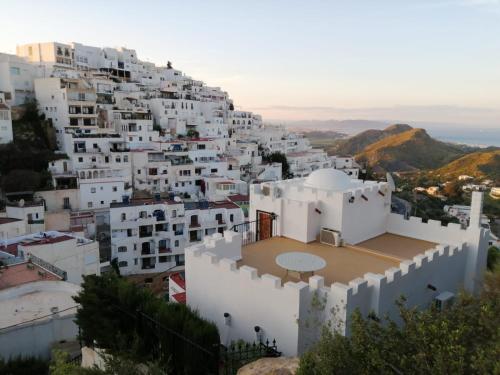 a view of a village with white buildings at MIRAMELINDO Encantador apartamento con terraza panorámica in Mojácar