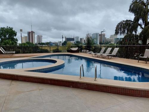 Piscina a Flat Particular Hotel Kubitschek o a prop