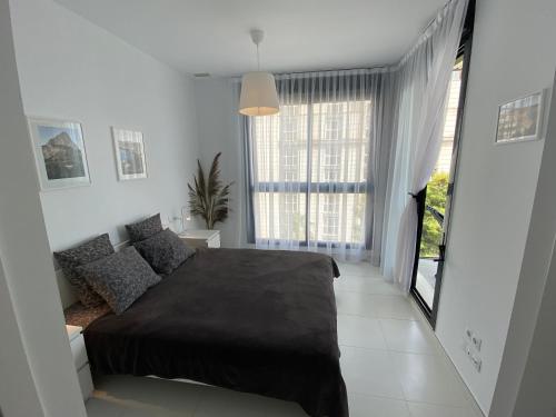 Postel nebo postele na pokoji v ubytování Calpe Beach 2 sea view & Ifach
