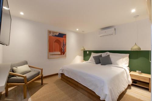 Villaz Luxury Vacation Homes tesisinde bir odada yatak veya yataklar