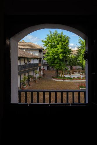 a view of a building from a window at Vista Corral del Conde in Seville