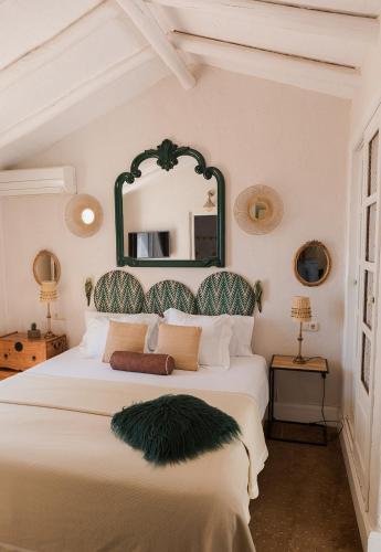 Ένα ή περισσότερα κρεβάτια σε δωμάτιο στο Posada Morisca Charming Hotel Boutique