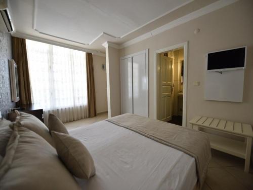 Televisyen dan/atau pusat hiburan di Nicholas Park Hotel