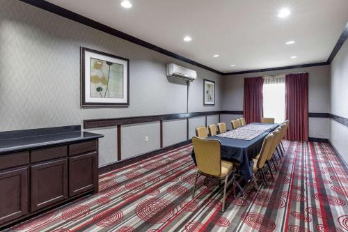 a conference room with a table and chairs at Best Western Plus DFW Airport West Euless in Euless