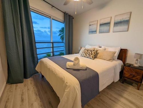 Postel nebo postele na pokoji v ubytování Eco Resort Condos