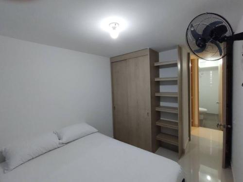 Postel nebo postele na pokoji v ubytování CONDOMINIO PEÑA AZUL LA MORADA