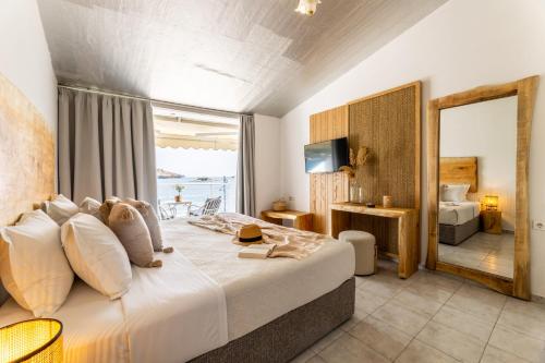 Кровать или кровати в номере Casa Blue Marine, Philian Collection