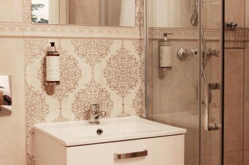 Kúpeľňa v ubytovaní Cosy & Perfect Located Apartment