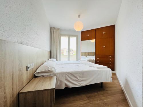 מיטה או מיטות בחדר ב-Sono Master Apartments