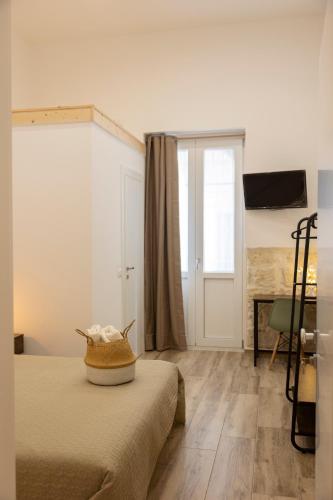 Katil atau katil-katil dalam bilik di Apulian House