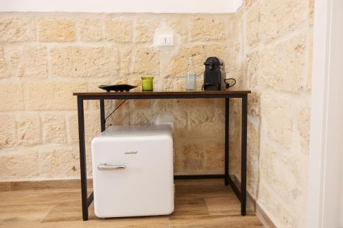 A kitchen or kitchenette at Apulian House