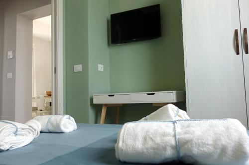 Letto o letti in una camera di La Finestra Sul Mare