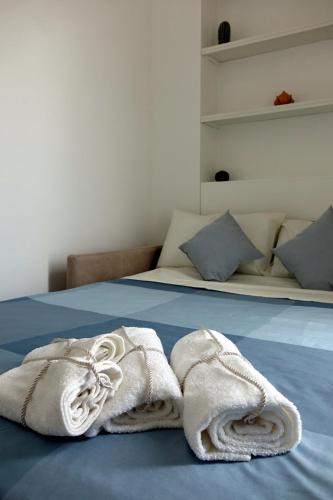 Letto o letti in una camera di La Finestra Sul Mare