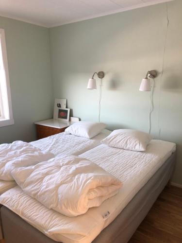 Ein Bett oder Betten in einem Zimmer der Unterkunft Messlingen 160