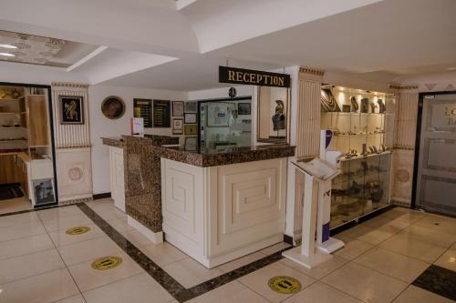 a shoe store with a counter in a room at Buyuk Truva Hotel in Canakkale