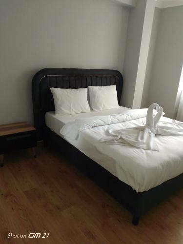 Postel nebo postele na pokoji v ubytování Siesta Suit