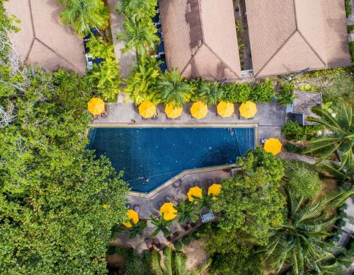 an overhead view of a swimming pool in a resort at Nai Yang Beach Resort and Spa in Nai Yang Beach