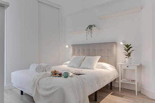 Cama o camas de una habitación en Central Square Deluxe Apartment
