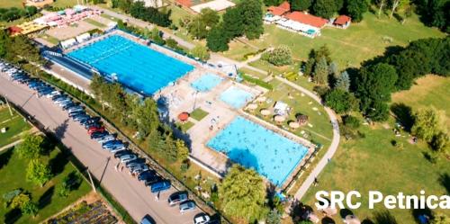 an aerial view of a resort with two swimming pools at Seosko turističko domaćinstvo "Klinačka priča" in Valjevo
