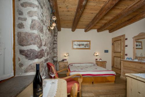 Postel nebo postele na pokoji v ubytování Historic Hotel Ristorante La Stua