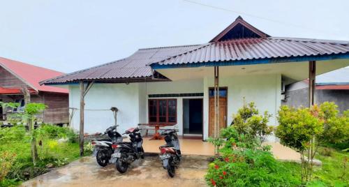 Сад в Prima Homestay Mentawai Mitra RedDoorz