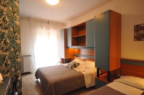 Postel nebo postele na pokoji v ubytování Hotel Crystal