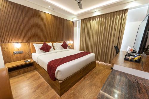Clarks Inn , Airport Bangaloreにあるベッド