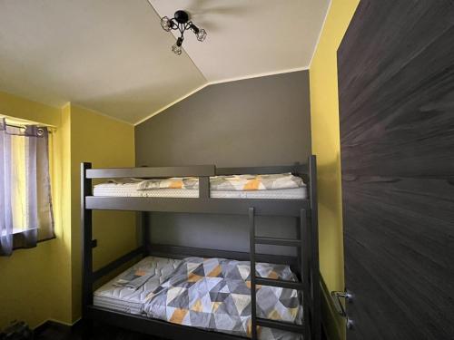 Krevet ili kreveti na kat u jedinici u objektu Holiday Home Anamaria
