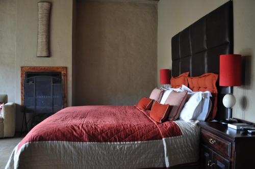 Postel nebo postele na pokoji v ubytování Tenahead Lodge & Spa