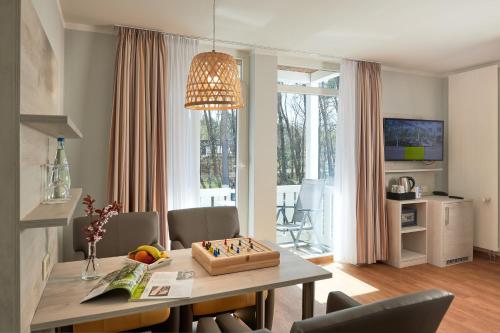 Kuchyň nebo kuchyňský kout v ubytování R&R Hotel Strandallee