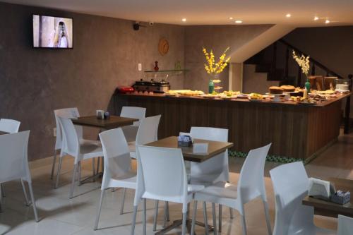 Onix Hotel Praia de Piata 레스토랑 또는 맛집