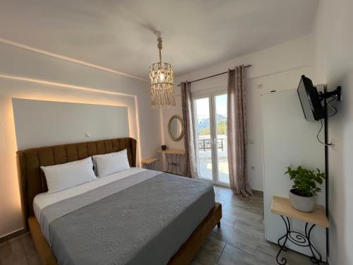 Postel nebo postele na pokoji v ubytování Filia suite-apartment agia anna naxos