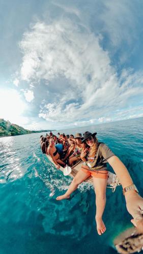 a group of people on a boat in the water at Butterfly Space- A Non-Profit Eco-Lodge in Nkhata Bay