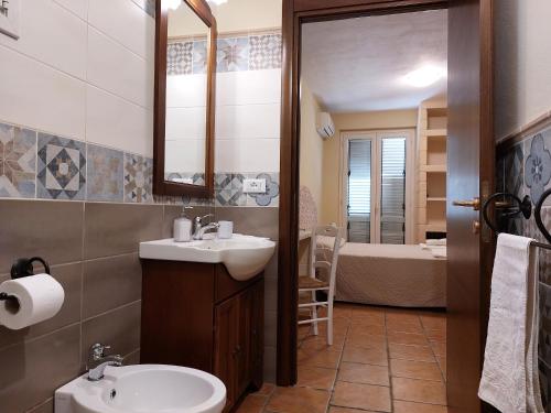 Ванная комната в Villa Rosa Candida