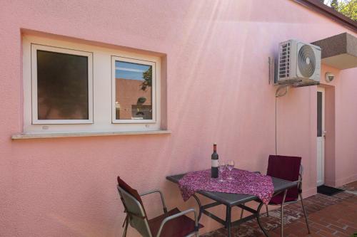 Televízia a/alebo spoločenská miestnosť v ubytovaní Lorena Apartment Dubrovnik