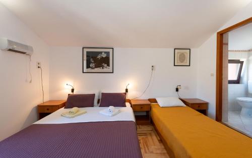 Llit o llits en una habitació de House Mitic